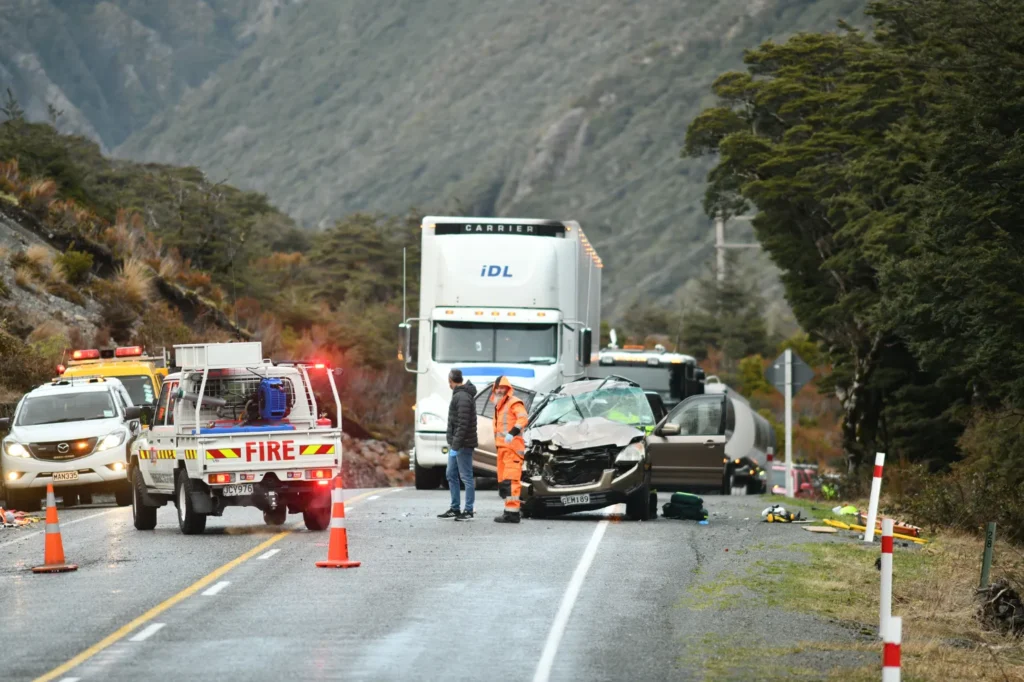 Emergency crews respond to a serious collision between a car and a semi-truck on a mountain road near El Paso, Texas.
